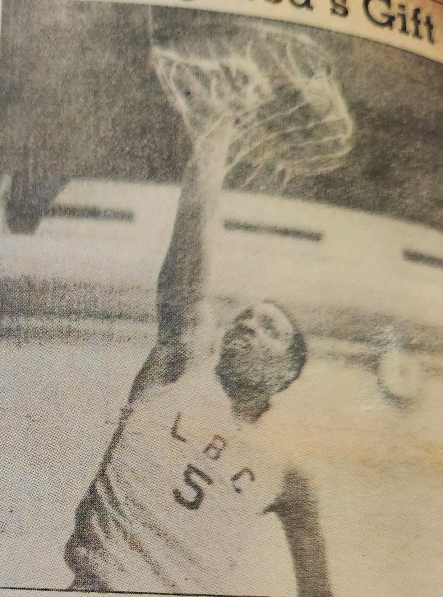 Dr. David Green playing basketball for Lancaster Bible College.