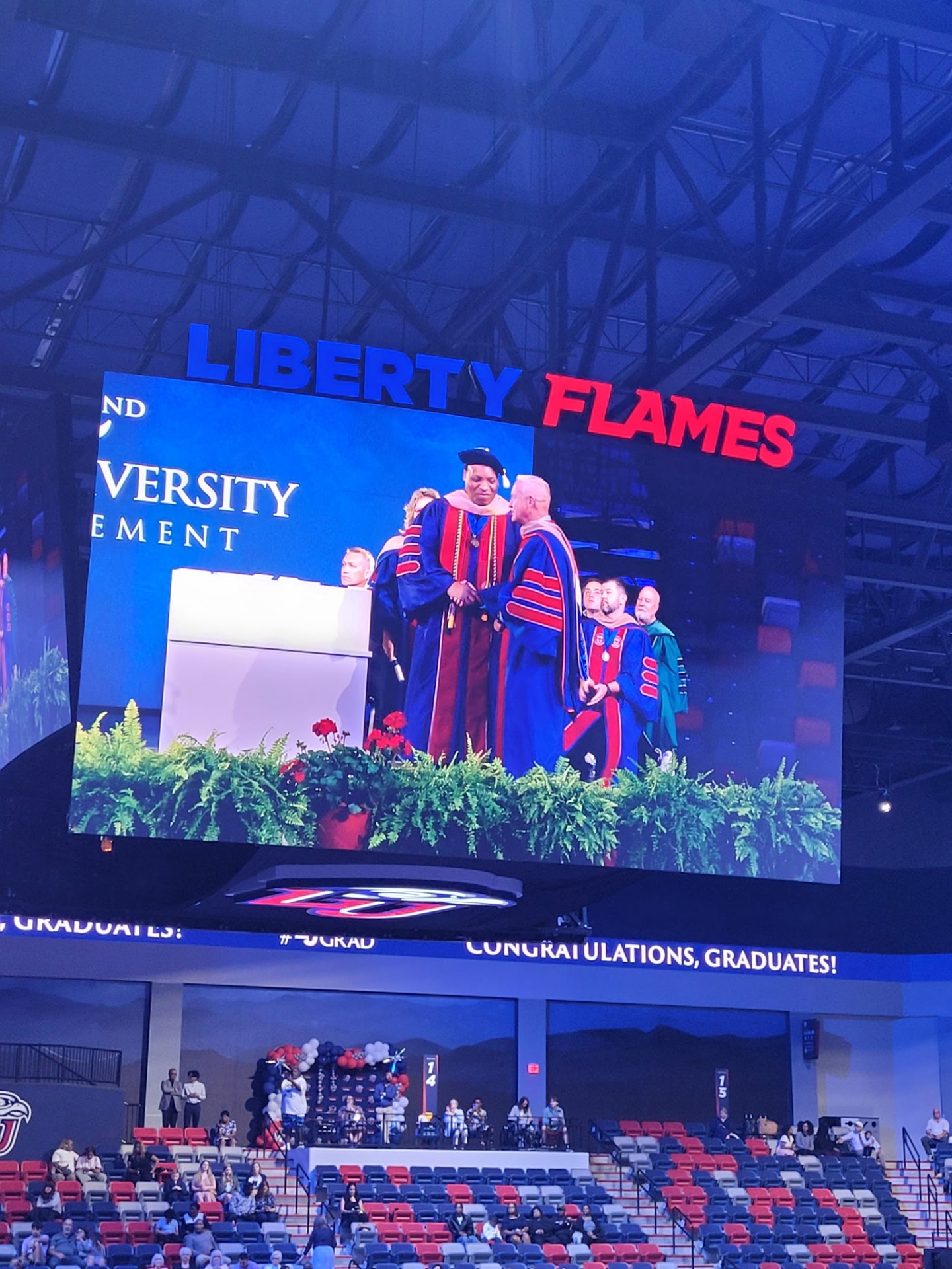 Dr. David Green receiving his doctorate at Liberty University commencement.