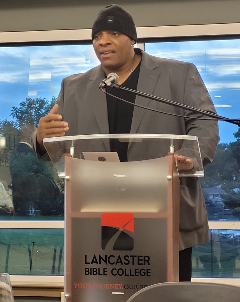 David Green, DSL, speaking at the podium during his 2023 Lancaster Bible College Hall of Honors induction.